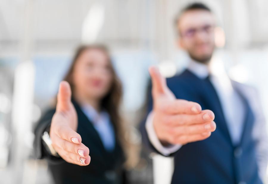 Aperto de mãos entre executivos